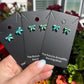 Bow earrings by Turnback Pony